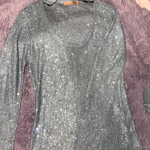 A silver knitted sequin material dress by Belldini
